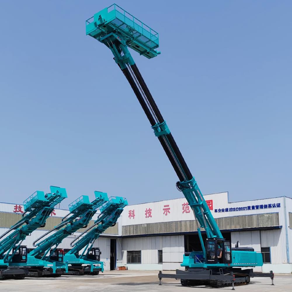 Large teal crawler slope drill shown at full lifting height in a supplier yard